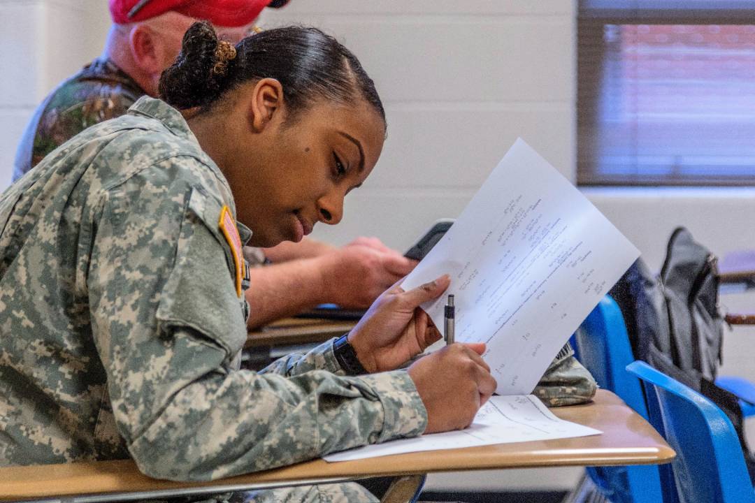 military student sitting at desk