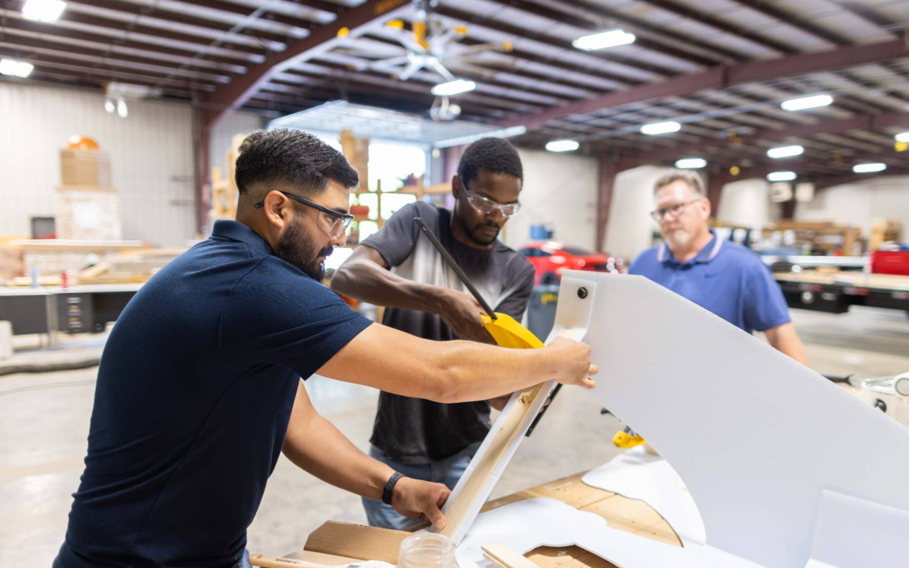 construction students putting together wing