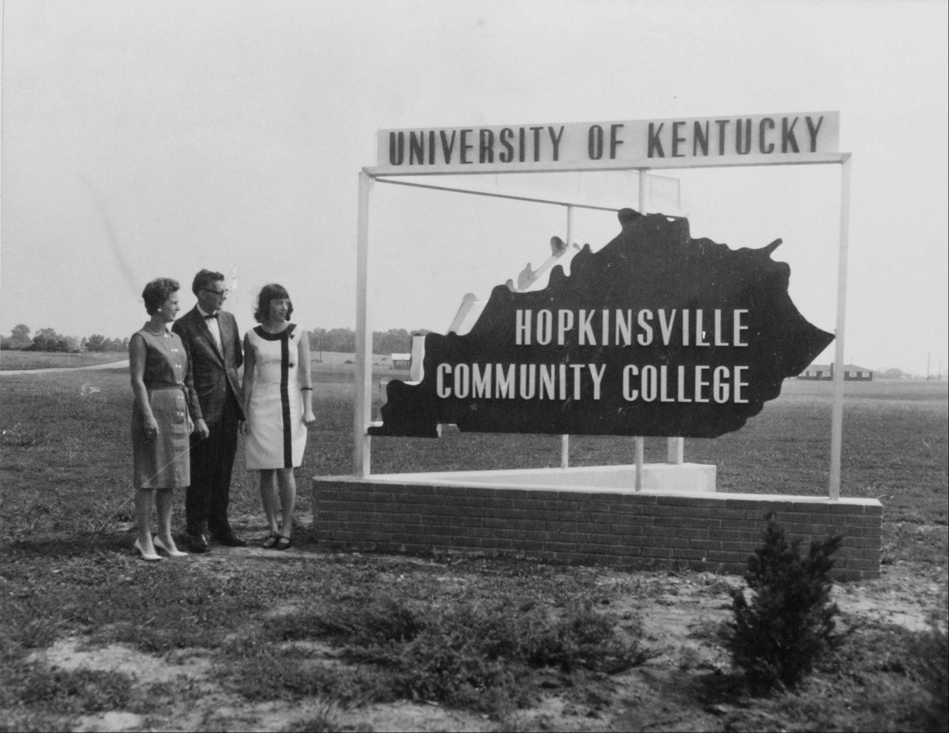 early HCC staff standing in front of early college sign